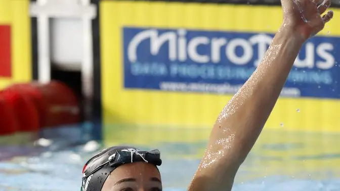 Margherita Panziera of Italy celebrates after finishing first the 200 meters backstroke women final at the European Swimming Championships in Glasgow, Scotland, Thursday, Aug. 9, 2018. (ANSA/AP Photo/Darko Bandic) [CopyrightNotice: Copyright 2018 The Associated Press. All rights reserved]