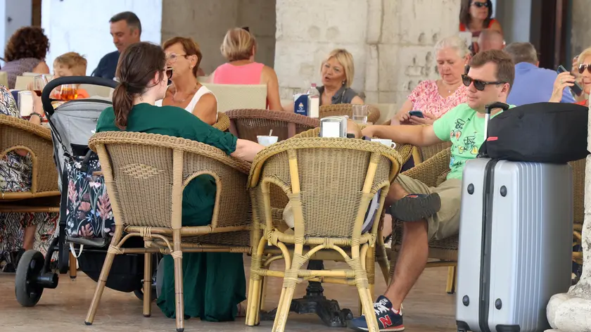 Turisti in centro storico