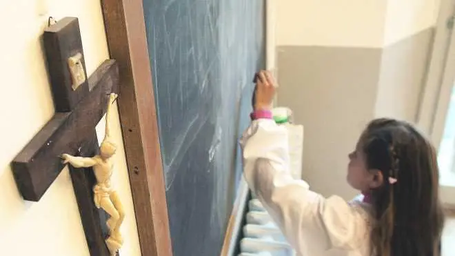 Una lezione in classe durante l’ora di religione
