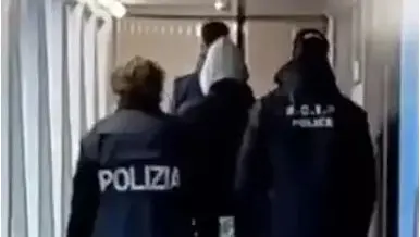 Mateo Garcia Molongo scortato dalla polizia