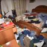 La camera da letto a soqquadro di una casa nel Vittoriese visitata nei giorni scorsi da una banda di ladri