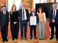 I genitori di Matteo Tomasi con il rettore e i delegati dell’università