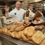 Roberto Serafin al forno con parte del pane rimasto invenduto