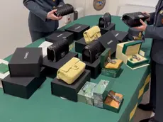 Borse e orologi di lusso acquistati con proventi illeciti