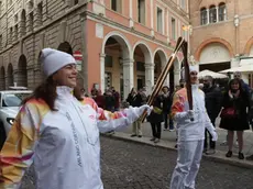 Il passaggio della fiamma paralimpica (Foto Mattiuzzo)
