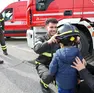 Vigili del fuoco durante una giornata di sensibilizzazione