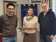 Marco Crepaz e Oscar De Bona con Alessandra Galli De Min (foto dal sito www.bellunesinelmondo.info)