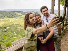 Un gruppo di turisti sulle colline Unesco
