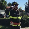 Pietro Monici con la divisa da pompiere