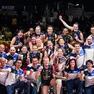 Le Pantere e lo staff di Conegliano esultano con la coppa della scorsa edizione della Champions (foto Cev)