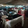 L’interno della ex Zanusso con i letti accatastati per ospitare 350 migranti