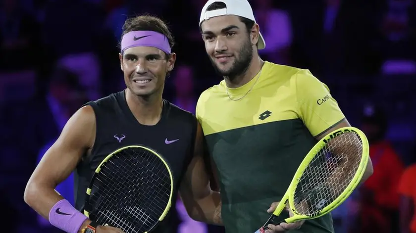 epa07824212 Rafael Nadal of Spain (L) and Matteo Berrettini of Italy pose at the net before thier Semi-Finals round match on the twelfth day of the US Open Tennis Championships the USTA National Tennis Center in Flushing Meadows, New York, USA, 06 September 2019. The US Open runs from 26 August through 08 September. EPA/JOHN G. MABANGLO