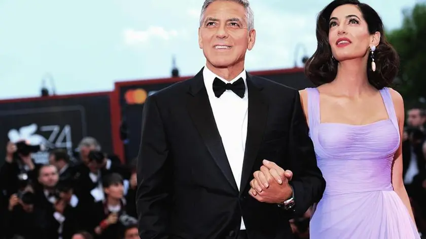 US film director George Clooney with his wife Amal Alamuddin arrive for the premiere of 'Suburbicon' during the 74th Venice Film Festival in Venice, Italy, 02 September 2017. The movie is presented in the official competition 'Venezia 74' at the festival running from 30 August to 09 September 2017. ANSA/CLAUDIO ONORATI