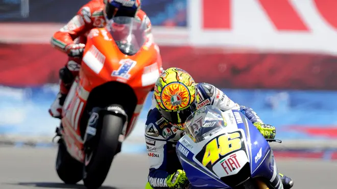20 Jul 2008, Monterey, California, USA --- Valentino Rossi (R) of Italy comes down the Corkscrew as Casey Stoner (L) of Australia follows during the MotoGP US Grand Prix at Mazda Raceway Laguna Seca in Monterey, California, USA. Rossi came in first-place while Stoner came in second. --- Image by © John G. Mabanglo/epa/Corbis
