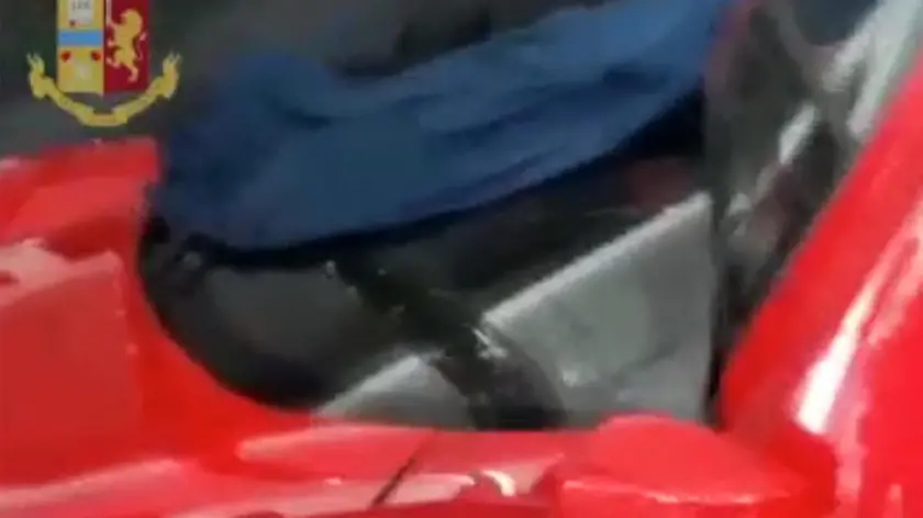Un fermo immagine tratto da un video della polizia di Treviso, 16 luglio 2020. La Polizia stradale di Treviso e il compartimento del Veneto (Padova), ha eseguito due arresti e dieci denunce per associazione a delinquere finalizzata al riciclaggio di auto, truffa aggravata ed autoriciclaggio. Uno dei due arrestati è il campione di rally Alain Valle (figlio del rallista Fabio) che insieme all'altro arrestato, Marco Bortoluzzi è ritenuto a capo di una organizzazione criminale capace di acquisire auto rubate o sottratte a società di noleggio, contraffare i documenti per poterle trasferire nella Repubblica Ceca dove i mezzi (apparentemente regolari per le autorità ceche) venivano "ripuliti" con una nuova e regolare immatricolazione straniera e poi di nuovo re-immessi nel mercato italiano. In questo complesso meccanismo un ruolo importante è stato svolto da due società operanti nel settore della compravendita di auto e di un'agenzia di pratiche automobilistiche che falsificava i documenti delle vetture. ANSA/POLIZIA EDITORIAL USE ONLY NO SALES
