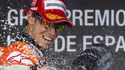 29 Apr 2012, Jerez de la Frontera, Spain --- epa03200308 Australian MotoGP rider of Honda team Casey Stoner celebrates on the podium his victory in the Motorcycling Grand Prix of Spain held at Jerez racetrack, southern Spain, 29 April 2012, ahead of Spanish of Yamaha Jorge Lorenzo, and Spanish teammate Dani Pedrosa. EPA/JULIO MUNOZ --- Image by © JULIO MUNOZ/epa/Corbis