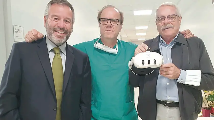 Da sinistra Davide Parolin, Carlo Cernetti e Giovanni Pavan con il visore Realica