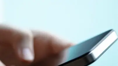 Hands texting on cell phone --- Image by © W2 Photography/Corbis